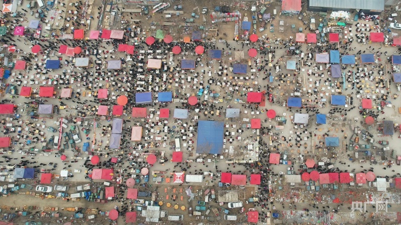 消费新观察｜从赶集到打卡 烟火气点燃年经济新活力